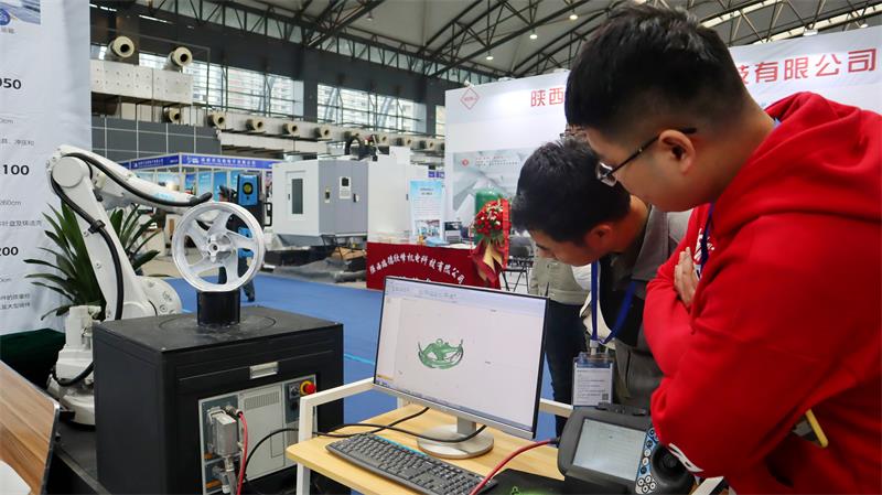 转载－【广播宝鸡·快讯】第二届中国（宝鸡）国际机器人暨智能制造展览会开幕(图4)